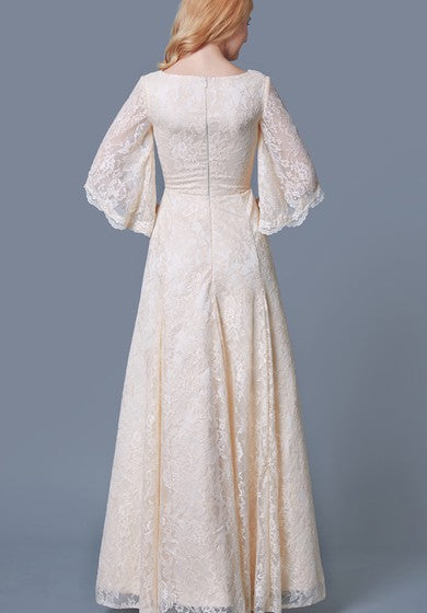 Robe longue élégante en dentelle à manches cloche et col en V