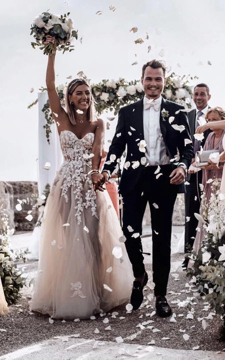 Sweetheart Flowy Empire A-Line Tulle Appliques Vestido de novia con tren de barrido