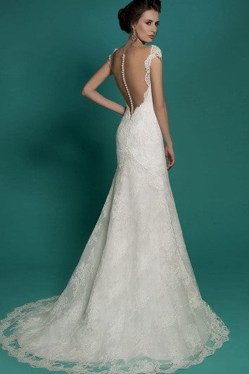 Abito in pizzo con manicotto al collo a V Merma.