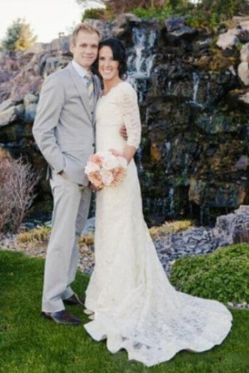 Robe de mariée romantique à manches 3/4 et en dentelle blanche style bohème modeste