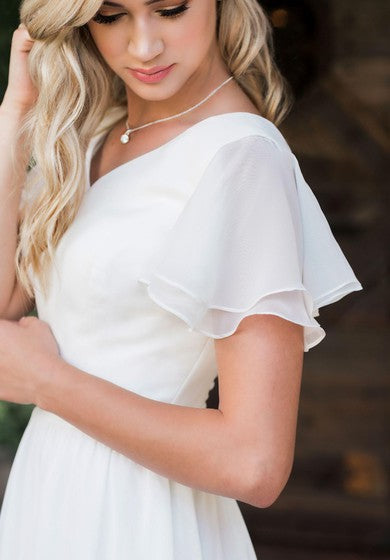 Chifón casual de cuello en V Un vestido de novia de manga corta de pincel de pincel hasta el suelo con volantes