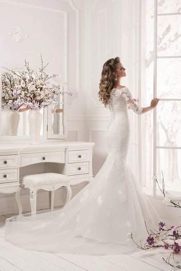 Abito da sirena in pizzo scollo a mezza manica