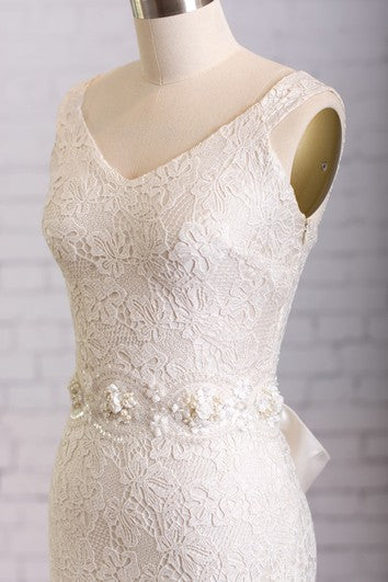 V-Neck Sleeveless Sheath With Bow And Beaded Belt