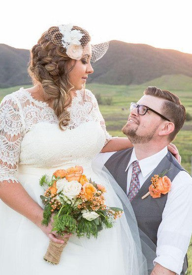 A abito in pizzo di pizzo a campana a mezza manica corta