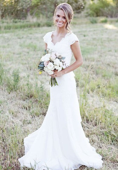 Robe fourreau en mousseline de soie à manches courtes et col festonné avec ceinture