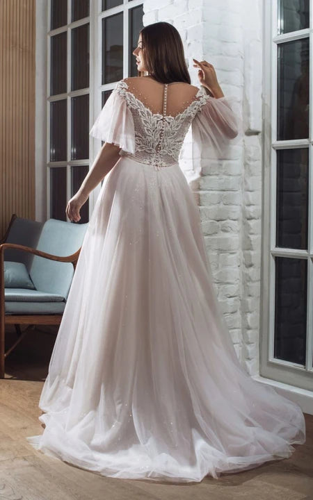 Robe de mariée trapèze élégante en tulle illusion à manches pétales et haut perlé