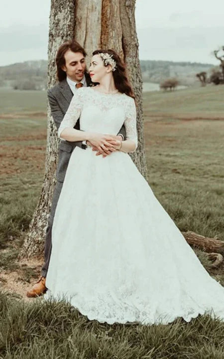 Pizzo senza schienale a mezza manica un abito da sposa vintage a-line