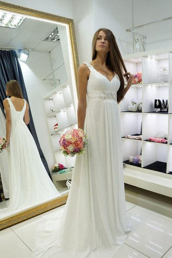 Robe de mariée empire en mousseline à bretelles et col en V