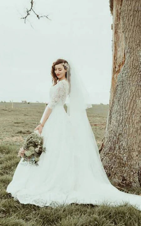 Pizzo senza schienale a mezza manica un abito da sposa vintage a-line