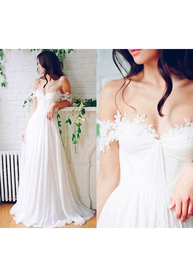 Robe de mariée en mousseline de soie à épaules dénudées et longueur au sol avec plis