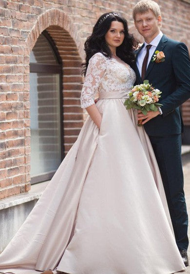 Robe de mariée grande taille en satin avec appliques et col en V et manches longues