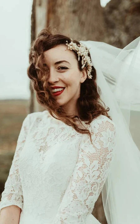 Pizzo senza schienale a mezza manica un abito da sposa vintage a-line
