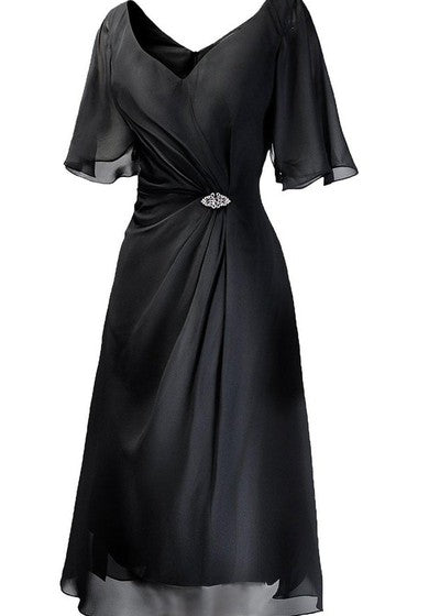 Abito a lunghezza del tè a maniche corte con perline e sconvolgimento