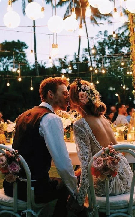 Abito da sposa a manica a maniche lunghe in pizzo bateau.