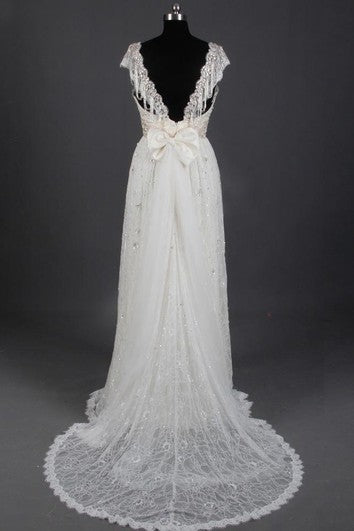 Šaty bez rukávů s kapkovým střihem a korálkováním