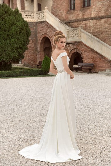 Abito da guaina decorato a V-the-shoulder a V.