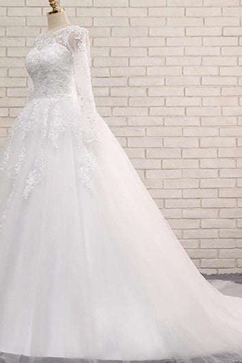 Robe trapèze longue à manches longues avec traîne chapelle et lacets dans le dos en tulle et dentelle à paillettes