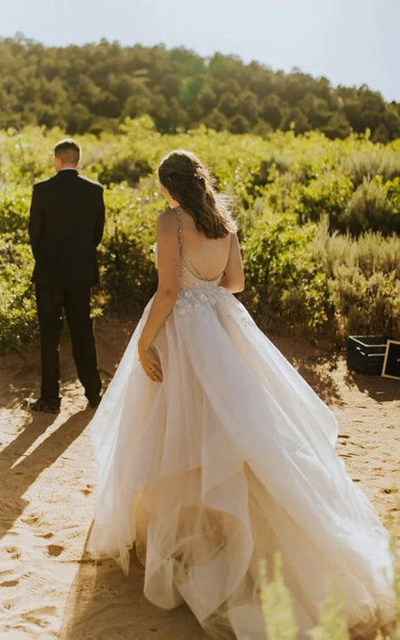 Robe de mariée dos nu en tulle spaghetti grande taille avec appliques